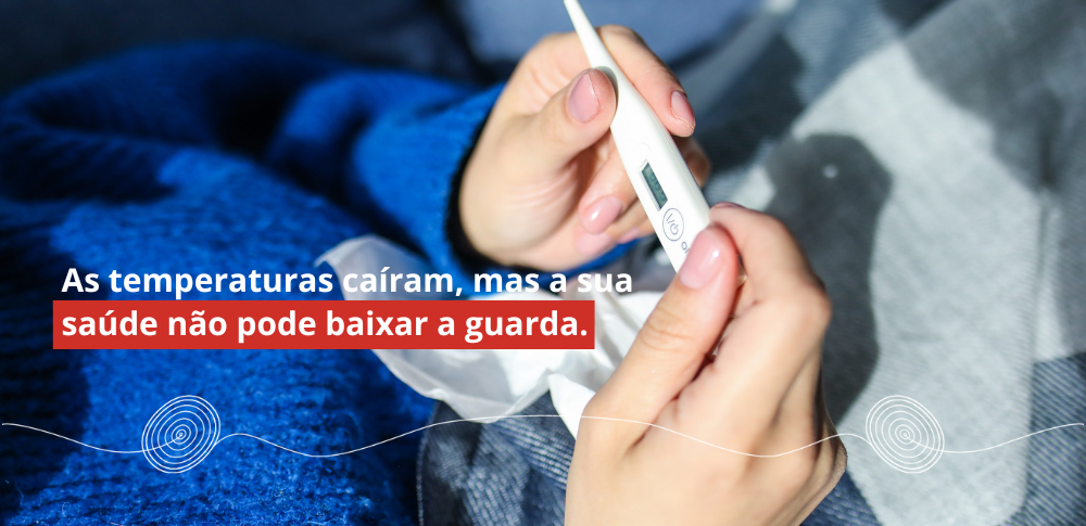 imagem para blog com mãos segurando o termometro